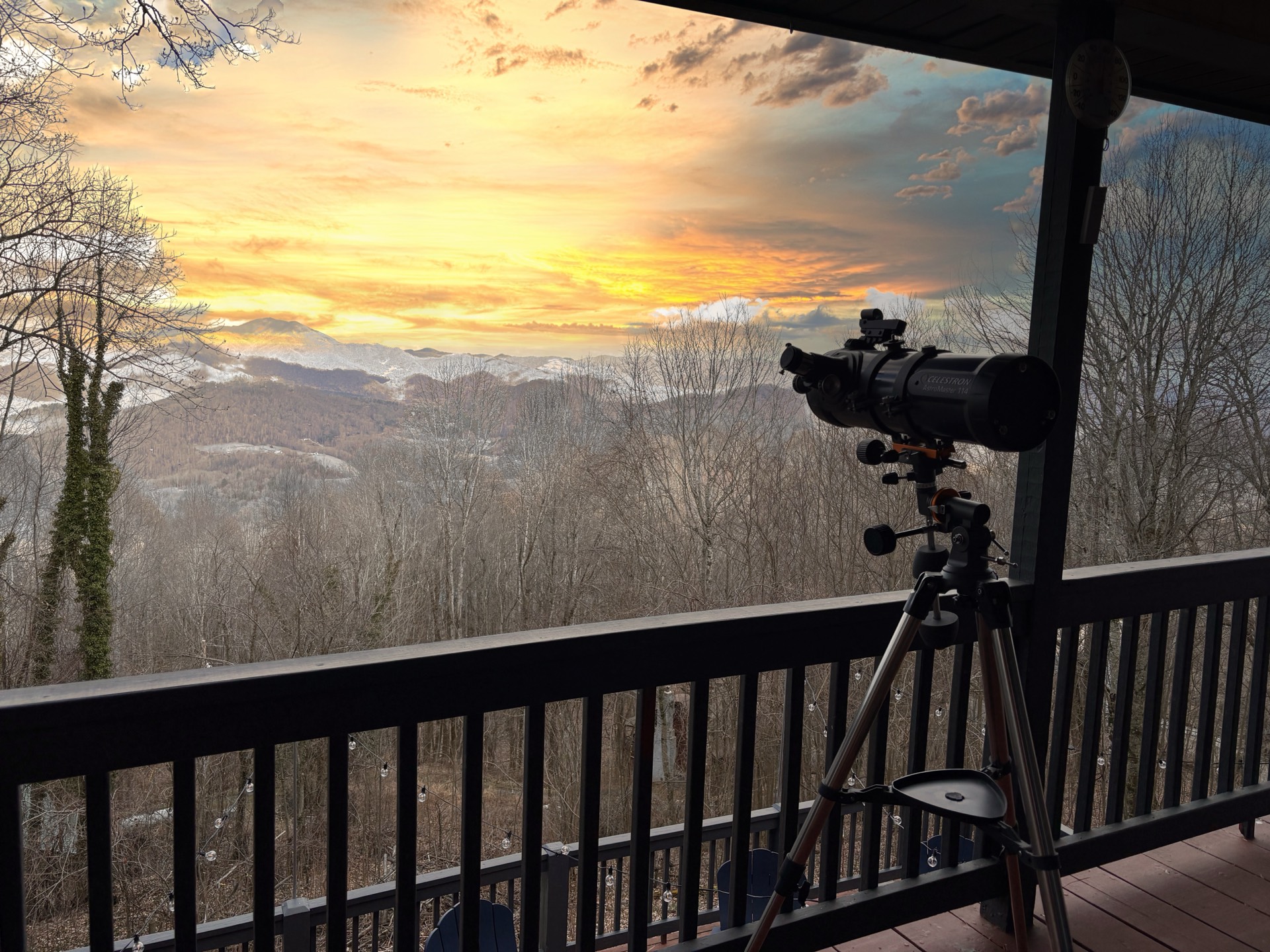 Mountain sunset from deck with telescope