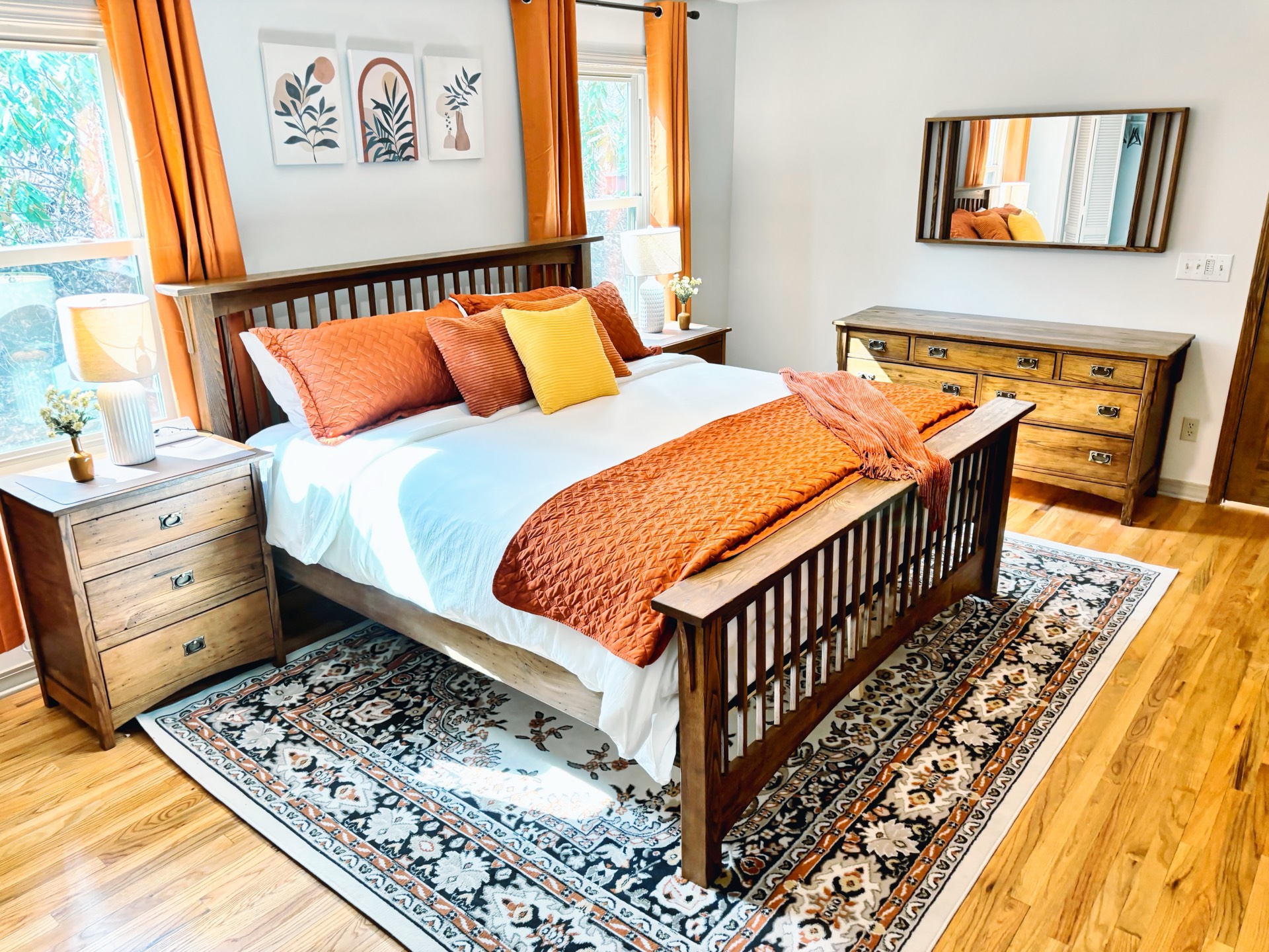 Master bedroom wide view with craftsman-style bed