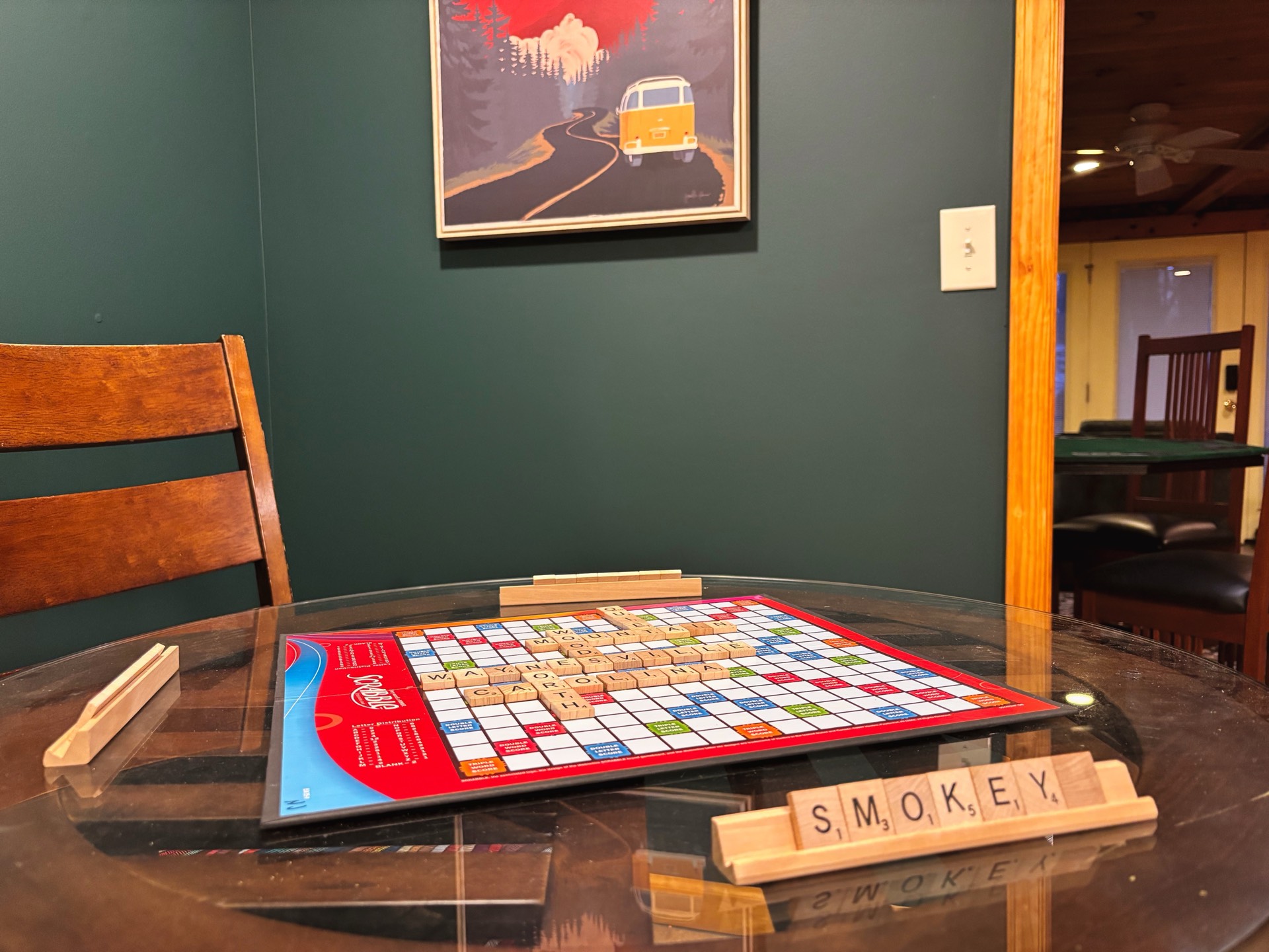 Scrabble board game on glass table